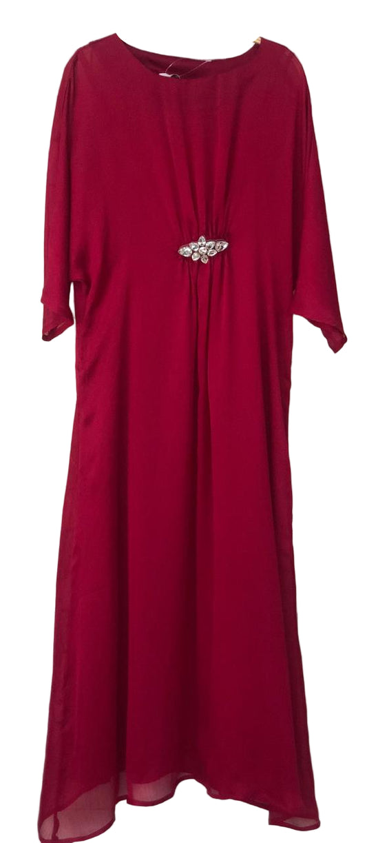 Red dress with a brooch