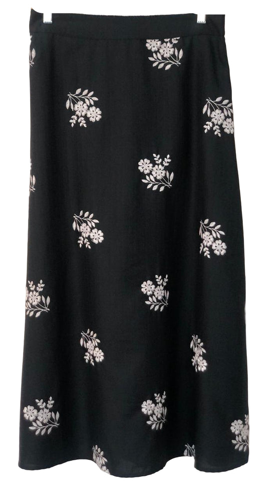 Black skirt with white floral patterns