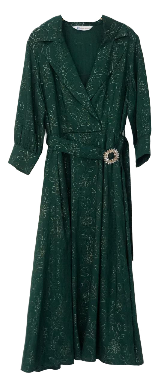 Green dress with a belt and brooch