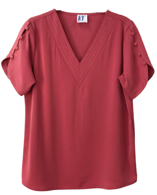 Red blouse with short sleeves