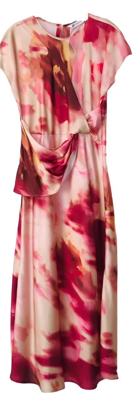 Tie-dye Dress with Pink and Red Patterns on a Tiled Wall