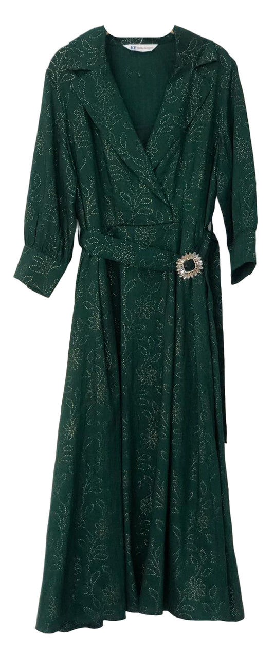 Green dress with a belt and brooch