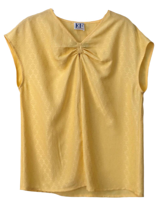 Yellow sleeveless top