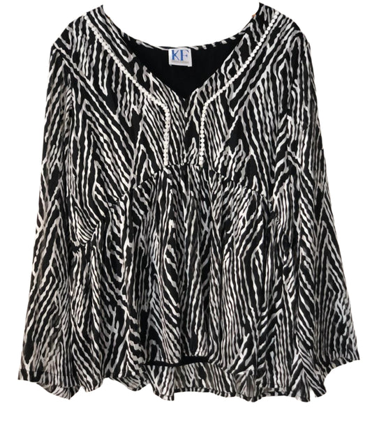 Black and white zebra patterned blouse