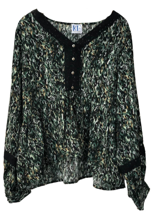 Green patterned blouse with black trim